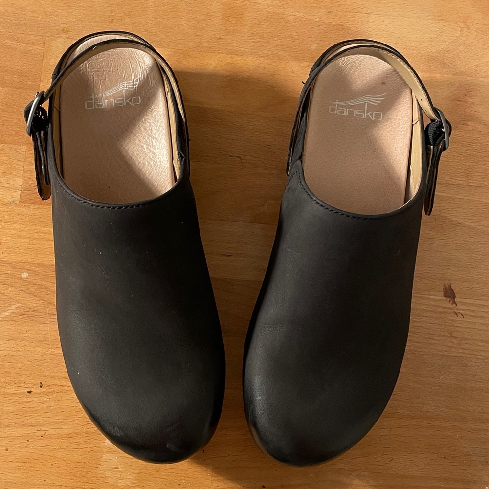 Dansko Black Slip-On Clogs with adjustable strap